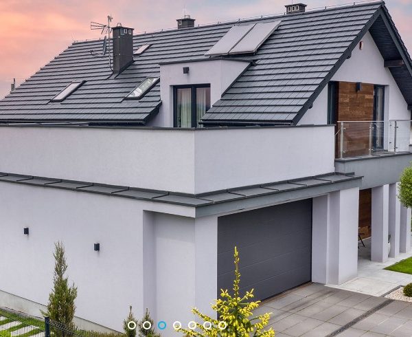 Dom z dachem pokrytym dachówką ceramiczną Creaton Domino w nowoczesnym stylu
